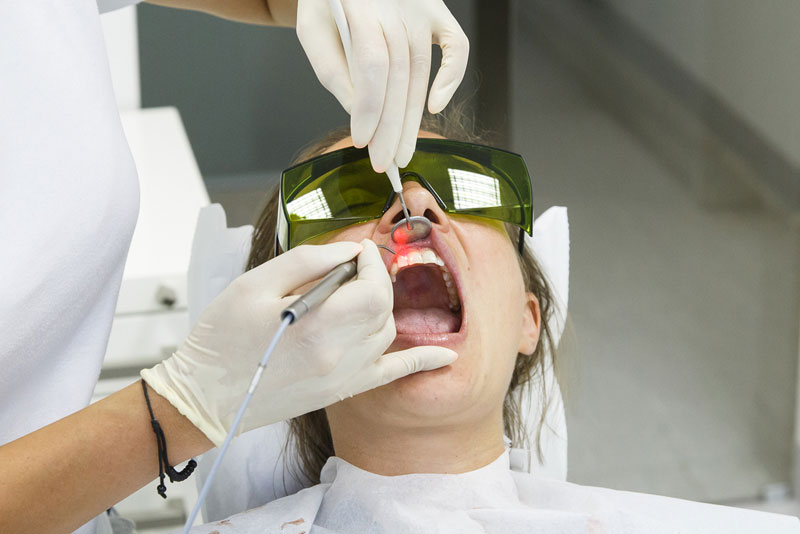 Dental Patient Undergoing Laser Gum Treatment