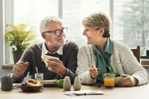 Dental Implant Patients Eating Together In Houston, TX